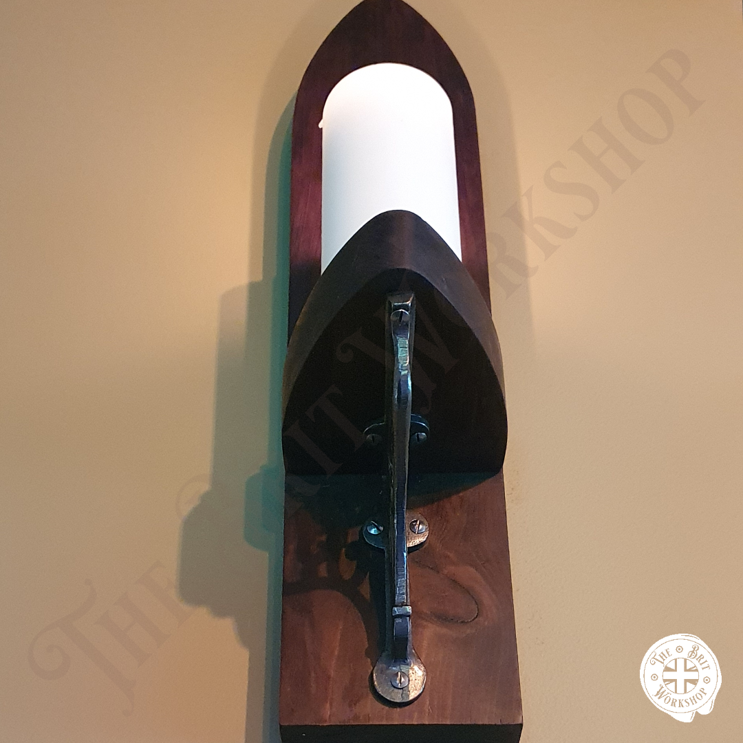 Gothic wooden and cast iron sconce