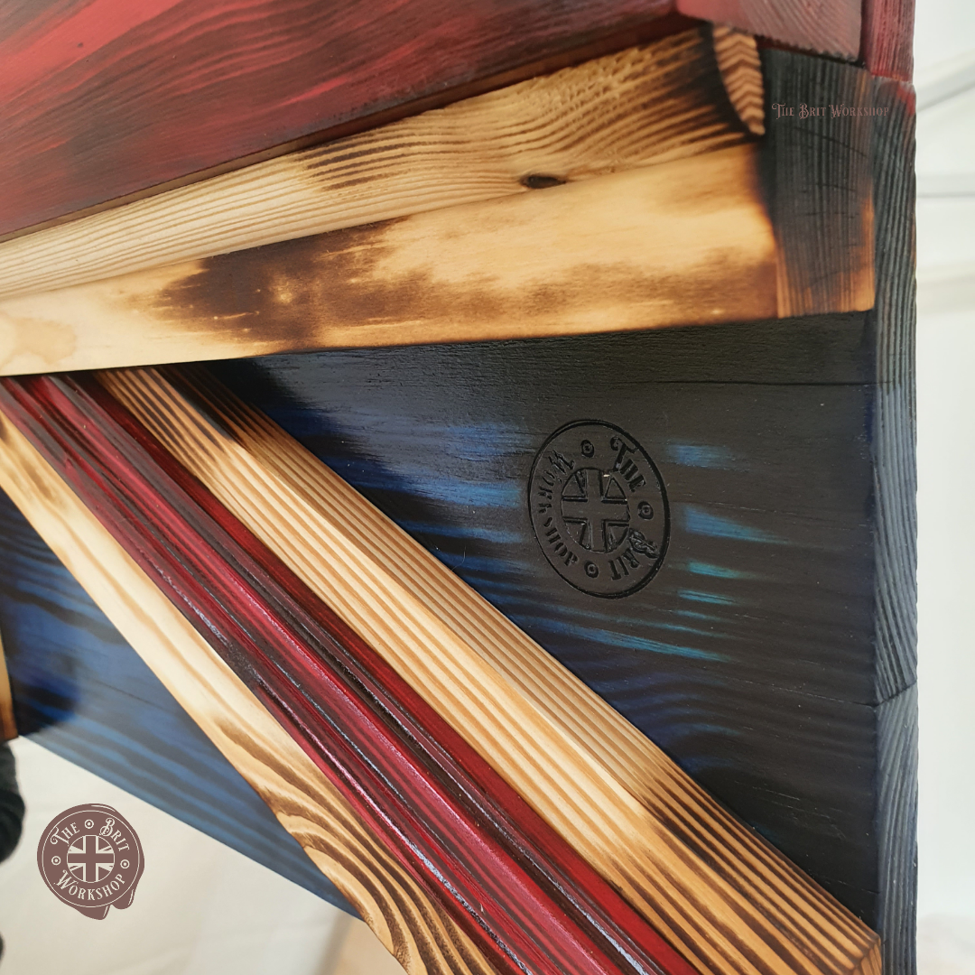 Wooden 3D British flag focusing on The Brit Workshop logo branded into the wood