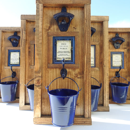 Five police call box style wall mounted bottle openers